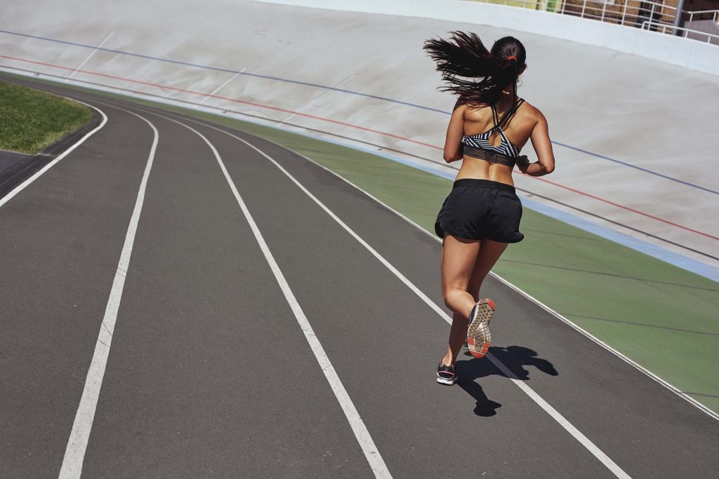 train-your-body-runner-on-the-stadium-track-woma-UU6JGLY.jpg